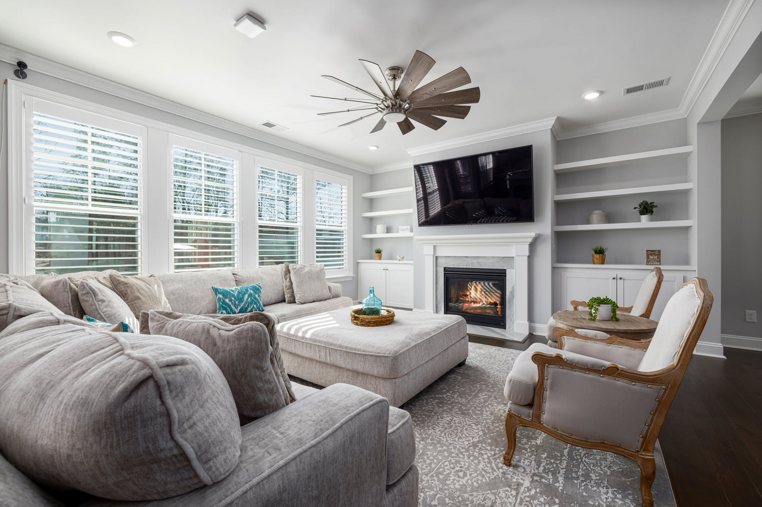 living room with large tan ottoman